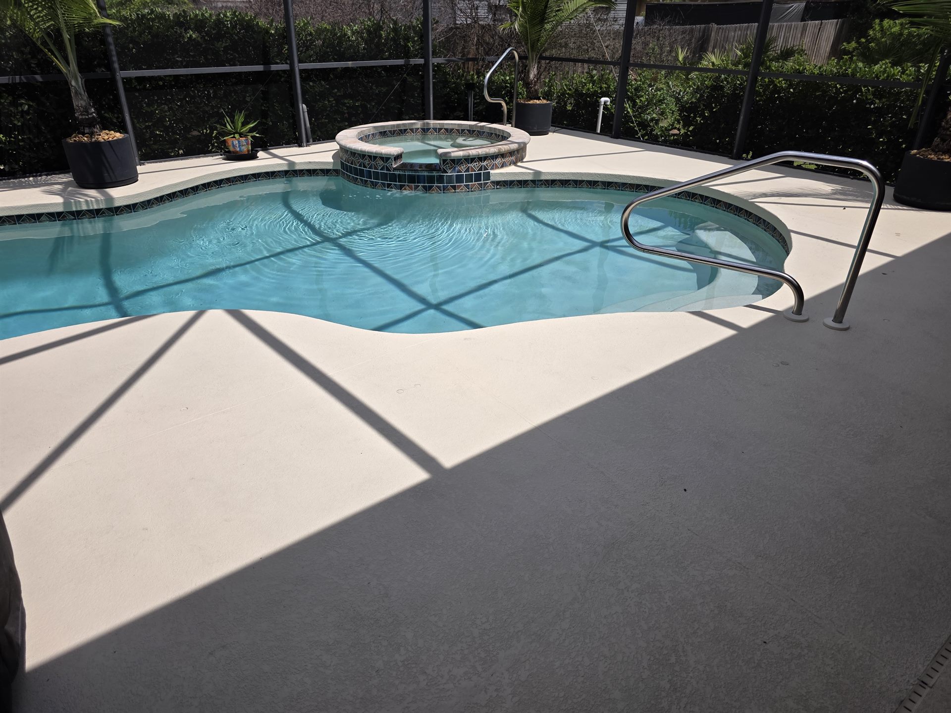 Pool and spa inside the screened lanai
